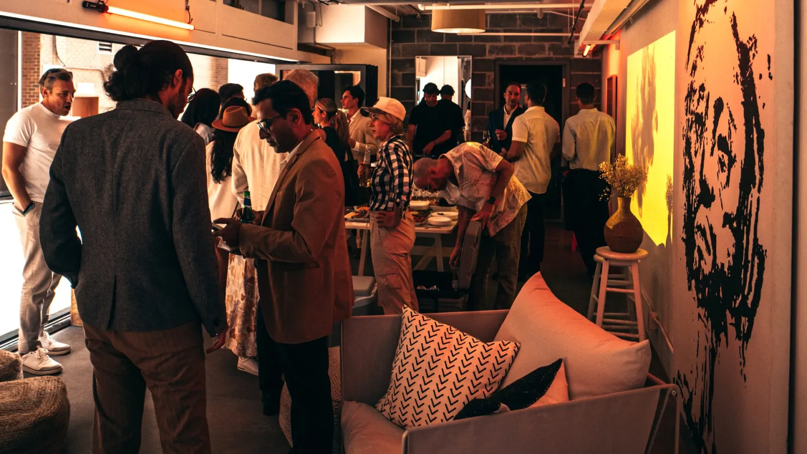 Members gathered at a Founder Feast event in Vancouver